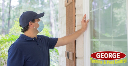 Pest control technician conducting home inspection